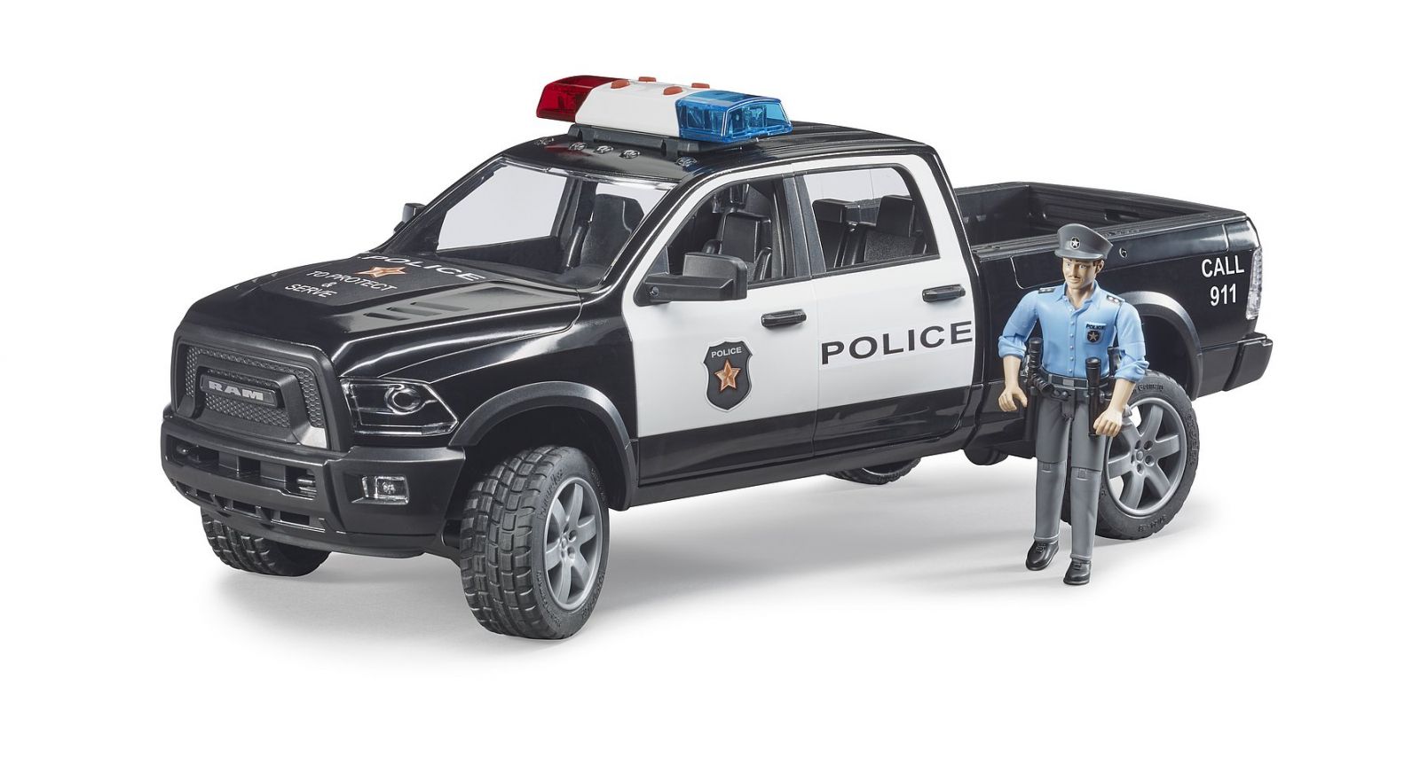 Dřevěné hračky Bruder Policejní auto RAM s policistou