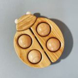 Dřevěné hračky Bajo Kousátko beruška natural